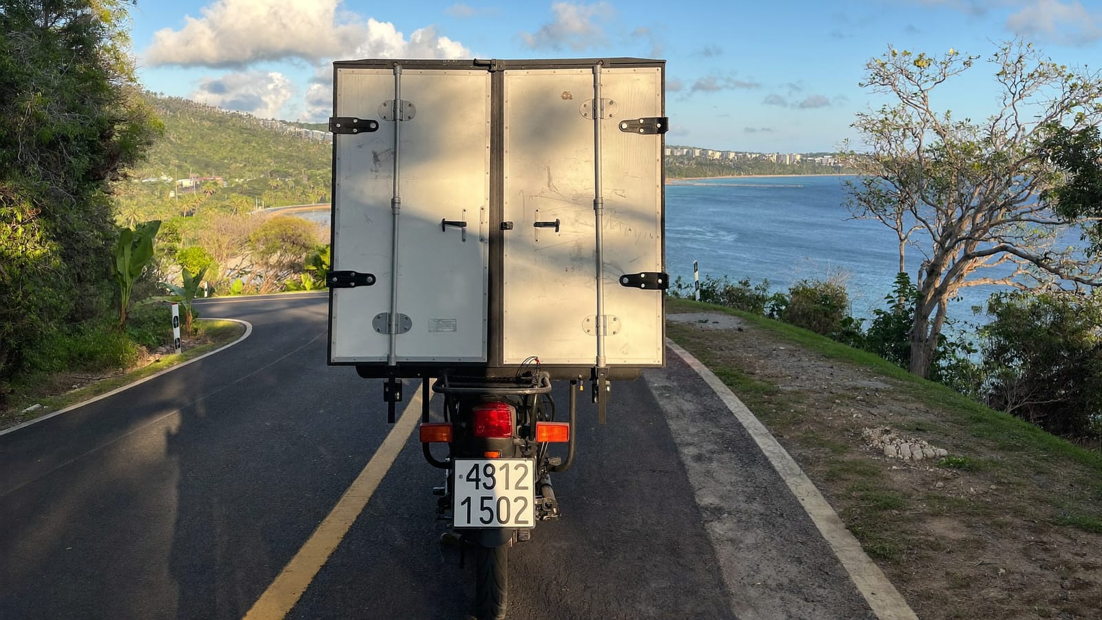 A rider on the road above San Juan del Sur bay